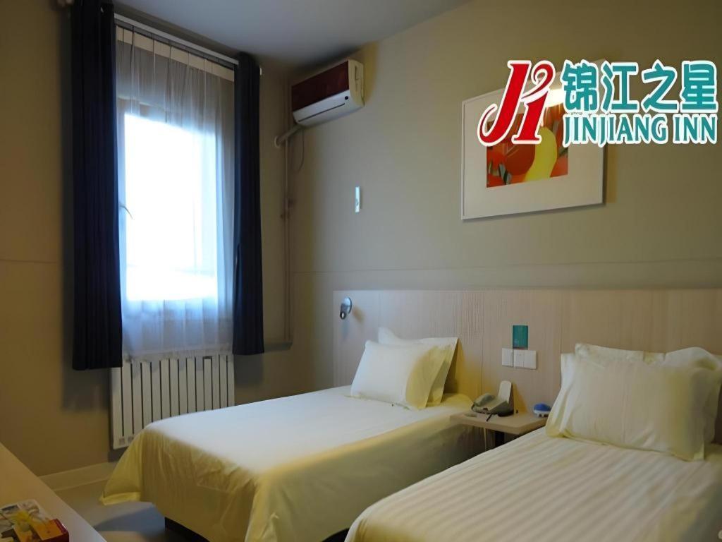 Jinjiang Inn Qingdao Wuxi Square Nanjing Road Metro Station Esterno foto